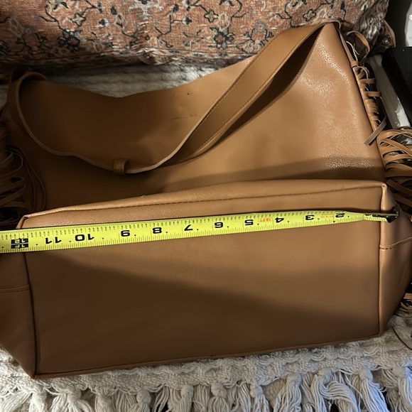 Jessica Simpson, faux leather Women Ten Tote, Color: Tan with fringe on sides.!! - Picture 6 of 7